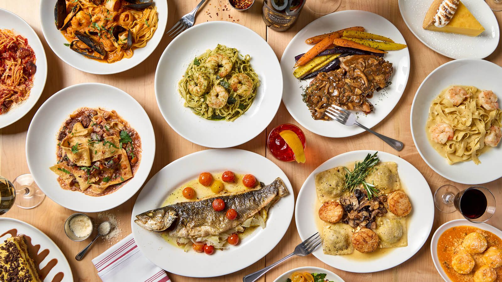 Overhead photo of multiple plates and drinks from the menu